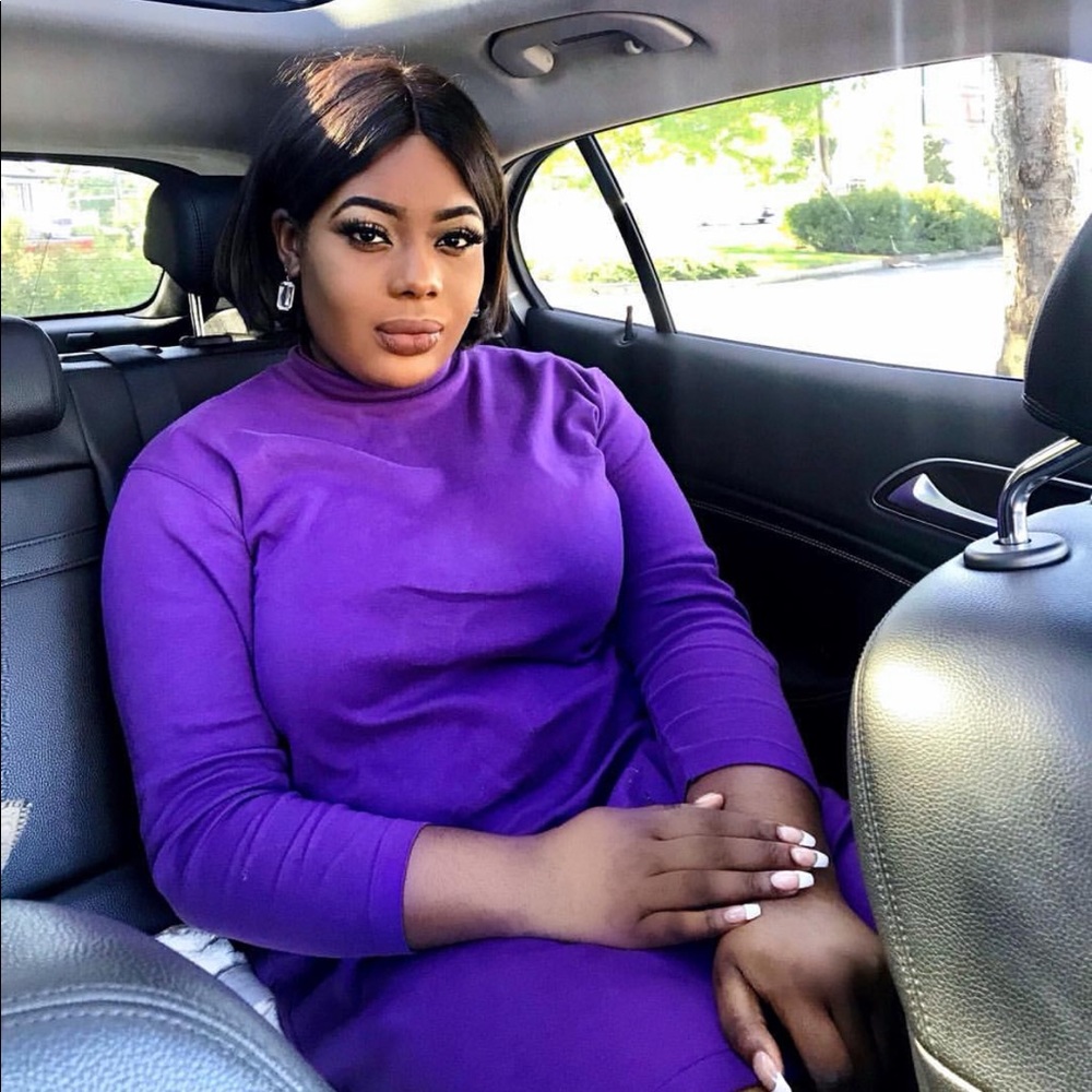 Purple turtle neck mid length dress